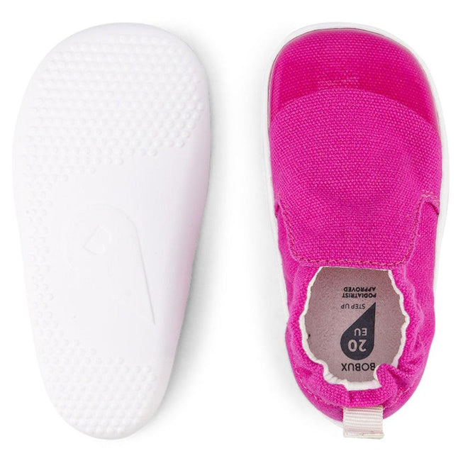 The Bobux Xplorer Scamp Crawler Fuchsia Pink 501708 features bright pink canvas slip-ons for babies, shown top and bottom; they have a white flexible, textured sole with the insole displaying size and brand., 32238, 9420068534599, 9420068534605, 9420068534612