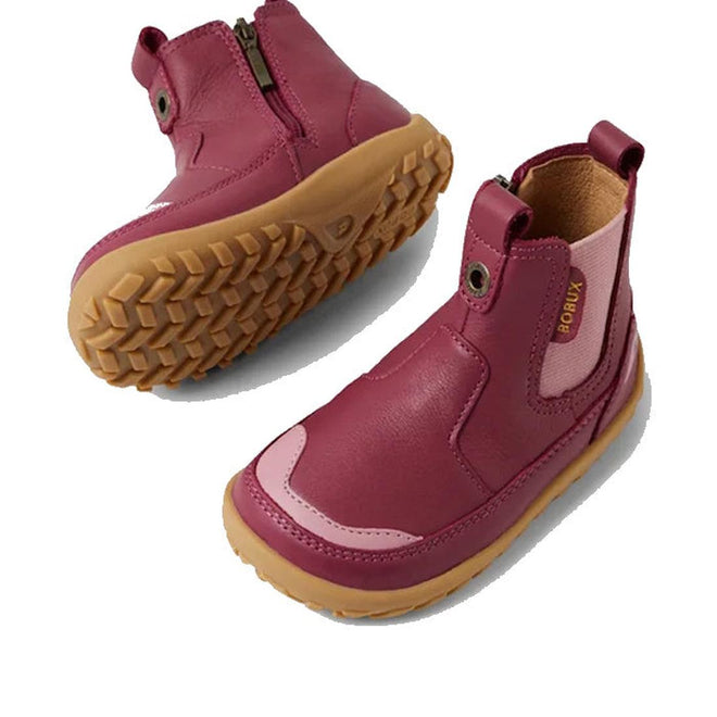 Two Bobux SU Step Up Trail Leather Boots in Beaujolias Purple with light brown rubber soles, side zippers, stretchy panels, and a barefoot-shaped toe-box—perfect for first walkers. The Bobux branding appears on one boot., 9420068578340, 9420068578357, 9420068578364