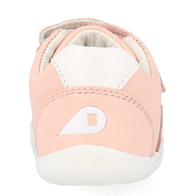 A close-up rear view of the Bobux Step Up SU Toddlers Leather Sneaker Comet Pink 734604, showing its soft pink and white design, flexible sole, a white B logo on the heel, and BOBUX embossed on the sole., 9420075706415, 9420075706422, 9420075706439, 9420075706446