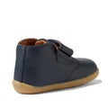 Navy blue toddler's Bobux Desert Step Up ankle boote with brown sole on a white background. Showing the heel and inner foot view, 9420062061213, 9420062056219, 22098