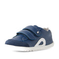 The Bobux SU Step Up Blaze Leather Toddlers Sneaker in Vintage Indigo features a blue leather upper with white accents, two Velcro straps, and a white rubber sole. Crafted from quick-drying leather, this comfortable first walking sneaker is displayed against a plain white background., 9420074848758, 9420074848765
