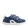 The Bobux SU Step Up Blaze Leather Toddlers Sneaker in Vintage Indigo is a blue and white first walking shoe for toddlers, featuring two velcro straps, white accents, a white rubber sole, and a rounded toe. It is shown in profile facing right on a plain white background., 9420074848758, 9420074848765