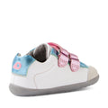 The Bobux SU Step Up Blaze Leather Toddlers Sneaker in White Pink features a gray sole, pink double straps, blue metallic and pink accents on the heel and tongue, and a beige toe cap. Shown at an angle from the back left side, these adorable kids’ leather sneakers are perfect for toddlers., 9420074848833, 9420074848840, 9420074848857, 9420074848864