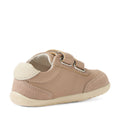 Introducing the Bobux Step Up SU Champ Sneaker First Walker in Warm Taupe—a light brown leather toddler shoe crafted to be an ideal first walker. Featuring a beige sole and accented with a white heel detail, this kids’ sneaker offers two convenient hook-and-loop straps for easy fastening. Shown here from the back and side against a white background., 9420074861894, 9420074861900, 9420074861917
