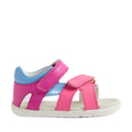 A vibrant children’s sandal, the Bobux SU Step Up Dune First Walker Open Toe Sandal in Rose Bright Pink, features bright pink adjustable straps, easy Velcro fastenings, and a comfortable white sole—thoughtfully designed for both style and comfort., 9420074856128, 9420074856135, 9420074856142