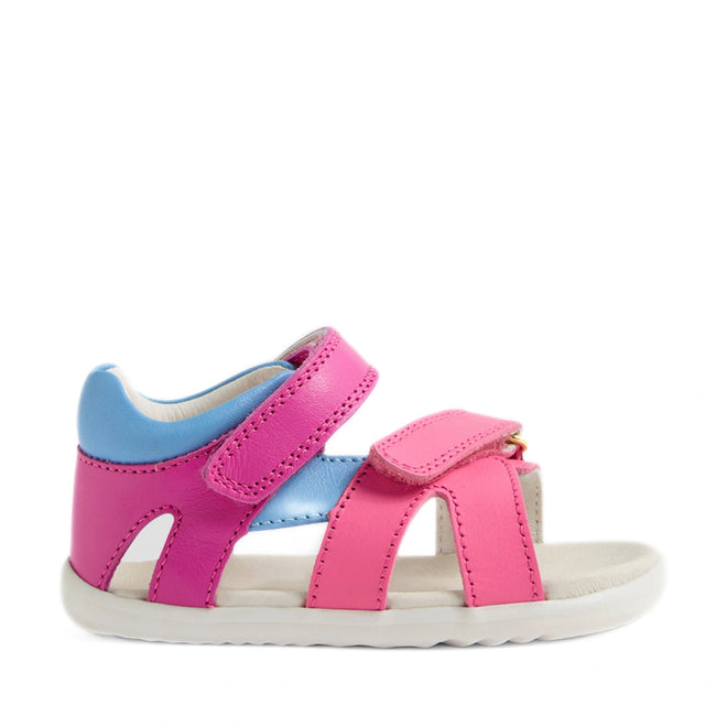 A vibrant children’s sandal, the Bobux SU Step Up Dune First Walker Open Toe Sandal in Rose Bright Pink, features bright pink adjustable straps, easy Velcro fastenings, and a comfortable white sole—thoughtfully designed for both style and comfort., 9420074856128, 9420074856135, 9420074856142