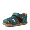 Introducing the Bobux Step Up Sandal Roam Closed Toe Sandals in Mediterranean Green—a leather sandal for children inspired by the classic Roam Toddlers design, featuring a closed toe, adjustable Velcro strap, open sides, tan interior, and a light brown rubber sole., 9420074807144, 9420074807151, 9420074807168, 9420074807175