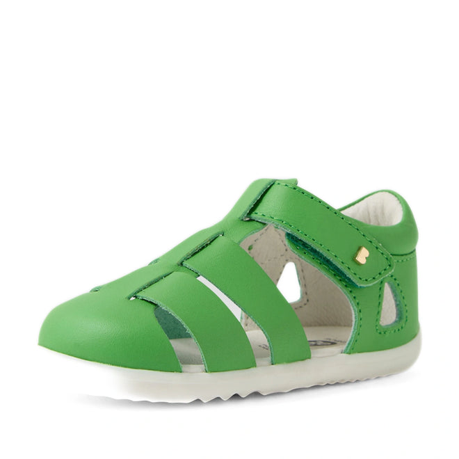 A Bobux Step Up SU Toddlers Tidal Retro Green Closed Toe Sandal featuring water-friendly leather, cut-out sides, a Velcro strap, and a closed toe—perfect for active little feet and shown against a white background., 9420074808424, 9420074808431, 9420074808448, 9420074808455