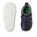 A pair of Bobux Step Up Grass Court Hi Boot Navy toddler sneakers with white textured soles, one shoe shown from the bottom and the other from the top; inside label reads “BOBUX x BLOOM, 20, EU.”., 9420075771741, 9420075774490, 9420075778368