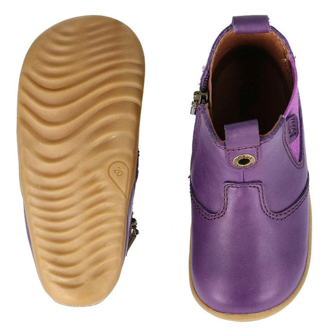 The Bobux Step Up Jodphur Boot Indigo Purple is a children’s leather boot with tan rubber soles. Shown from top and bottom, highlights include a textured sole, side zipper, and decorative stitching—ideal for first walkers., 9420075788879, 9420075789456, 9420075788916, 35573