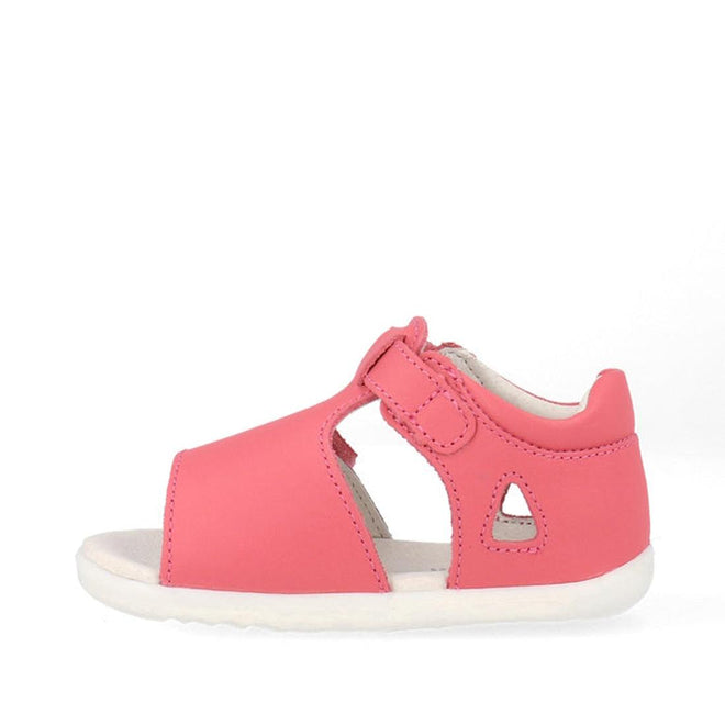 The Bobux Step Up Mirror Leather Sandal in Guava Bright Pink Rainbow 727341 is a toddler sandal with an open toe, side cutouts, soft white sole, and Velcro strap, shown in a side view on a white background., 9420075704640, 9420075704657, 9420075704664, 9420075704671