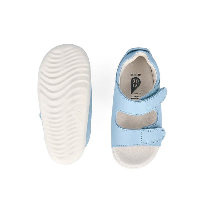 The Bobux Step Up - Topia Sandal First Walking Glacial Blue (751303) in size 20 EU is a light blue toddler sandal with white soles, two adjustable Velcro straps, supportive design, and shown from the top and bottom., 39287, 9420075763760, 9420075763678, 9420075763777