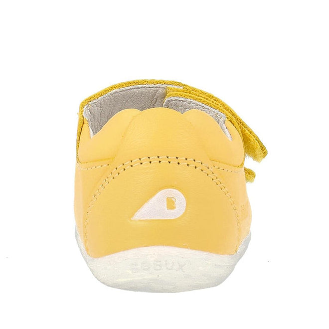 The Bobux Step Up - Topia First Walker Sandal 751304 in Pineapple Yellow is a baby leather sandal with a white sole, scalloped edge, and a small B logo inside a white teardrop near the heel, shown from the back., 9420075763722, 9420075763654, 9420075764422, 9420075764446