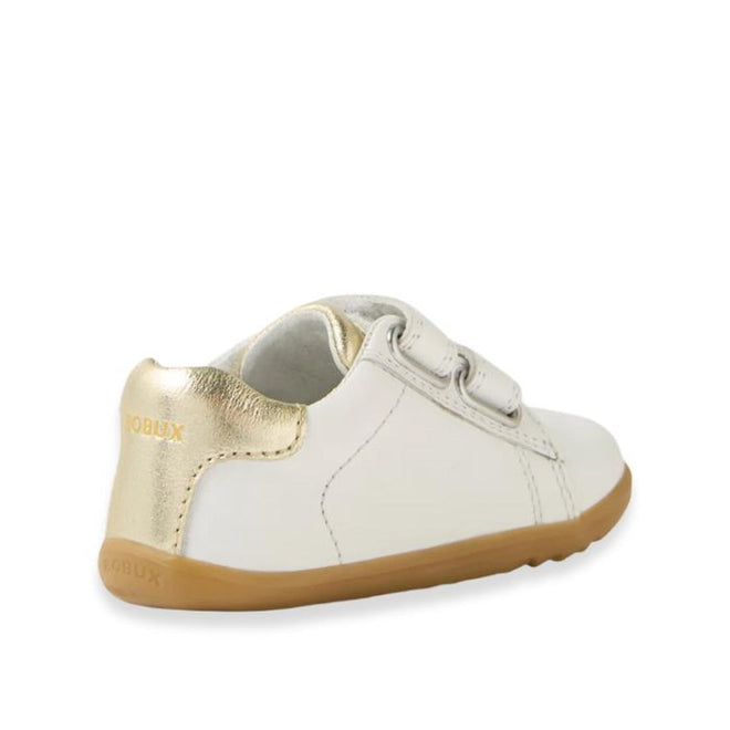 The Bobux SU Step Up Maverick Leather Toddlers Sneaker in White Gold features a small white leather design, gold heel accents, brown rubber sole, and two adjustable straps—perfect as a first walker for toddlers., 9420074836748, 9420074836755, 9420074836762