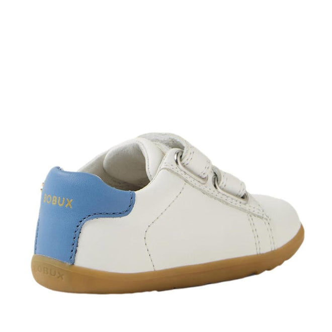The Bobux SU Step Up Maverick Leather Toddlers Sneaker in White Coronet Blue is a small white leather first walker with a light brown sole, blue heel accent, gold Bobux branding, and two Velcro straps for comfy steps., 9420074836793, 9420074836809, 9420074836816