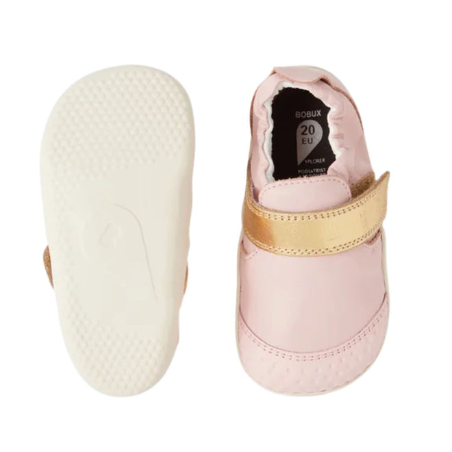 The Bobux XP Xplorer First Walking Shoes Go Ballet Pink feature light pink leather with gold straps; one shoe is shown top-down, the other highlights the flexible sole—perfect pre-walkers for your little one's first steps., 9420068568105, 9420068568112, 9420068568129, 9420068568136