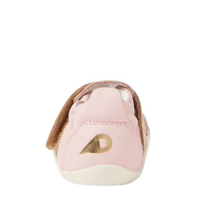 The Bobux XP Xplorer First Walking Shoes Go Ballet Pink feature soft pink leather, a gold heel accent, and a white flexible sole—designed for comfort and support during your child's first steps., 9420068568105, 9420068568112, 9420068568129, 9420068568136