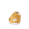 The Bobux XP Xplorer First Walking Shoes Go Oak Buff Tan are tan pre-walker leather shoes seen from the back, with a flexible white sole and a white triangle B logo on the heel, set against a plain white background., 9420068567962, 9420068567979, 9420068567986