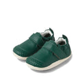 Bobux XP Xplorer First Walking Shoes Go Mediterranean Green: dark green pre-walker leather shoes for little ones, featuring white soles, Velcro straps, textured toes, and flexible soft material for comfort and easy wear.