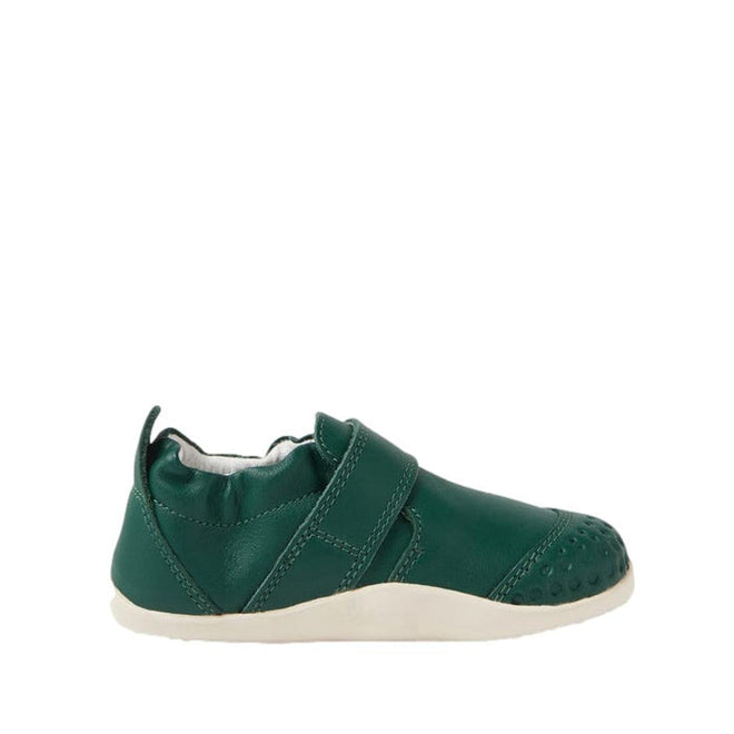 A single Bobux XP Xplorer First Walking Shoe in Mediterranean Green for toddlers, featuring a flexible sole, white trim, velcro strap, textured toe area, and heel pull tab, shown from the side on a white background., 9420074808820, 9420074808837, 9420074808844, 9420074808950