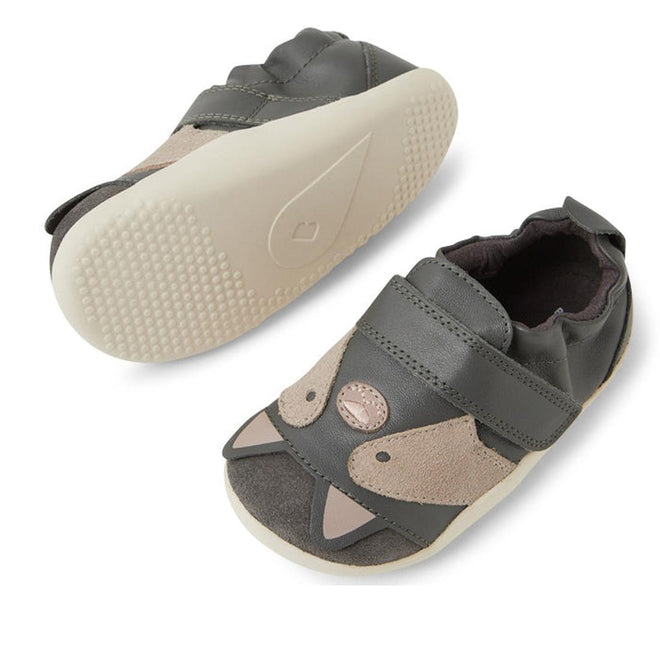 The Bobux XP Xplorer Scrunch First Walking Shoes in Smoke Grey feature cat face designs with ears and whiskers, an adjustable strap, and a textured sole with a heart-shaped logo—perfect pre-walker shoes for toddlers., 9420074805850, 9420074805867, 9420074805874, 9420074805881, 9420074805843, 9420074805850, 9420074805867, 9420074805874, 9420074805881