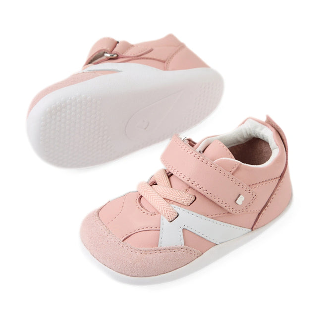 Bobux Xplorer XP Chase Ballet Pink First Walker Crawler—toddler sneakers in a soft pink hue, featuring white soles, pink and white accents, laces, and a Velcro strap. Perfect as pre-walker shoes or stylish baby sneakers, displayed on a white background., 9420074850683, 9420074850690, 9420074850706, 9420074850713