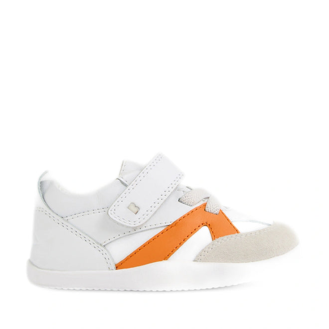 The Bobux Xplorer XP Chase White Orange Peel First Walker Crawler features a white design with a beige toe, orange accent on the side, gray laces, and a Velcro strap. These pre-walker shoes have a flexible sole to provide comfort and support for little feet., 9420074850737, 9420074850744, 9420074850751, 9420074850768
