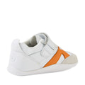 Bobux Xplorer XP Chase White Orange Peel First Walker Crawler, shown from the side, features a soft, flexible sole and a Velcro strap. The toddler sneaker highlights an orange X design on the side and suede detailing on the toe area—ideal as pre-walker shoes or baby sneakers., 9420074850737, 9420074850744, 9420074850751, 9420074850768