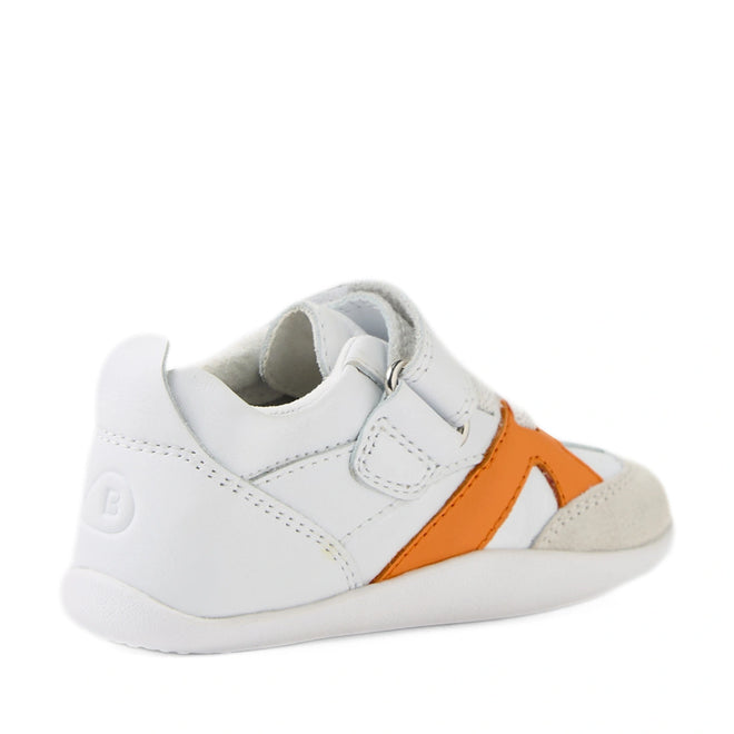 Bobux Xplorer XP Chase White Orange Peel First Walker Crawler, shown from the side, features a soft, flexible sole and a Velcro strap. The toddler sneaker highlights an orange X design on the side and suede detailing on the toe area—ideal as pre-walker shoes or baby sneakers., 9420074850737, 9420074850744, 9420074850751, 9420074850768