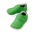 A pair of Bobux Xplorer XP Go Retro Green First Walker Crawler toddler shoes with Velcro straps and white soles, placed side by side on a white background.