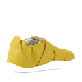 The Bobux Xplorer XP Go Mango Mint First Walker Crawler is a yellow slip-on shoe with a white sole, shown from the back and side at an angle. It features elastic panels and smooth leather material—ideal as soft leather baby shoes or stylish first walkers for little ones learning to take their first steps., 9420074809339, 9420074809346, 9420074809353