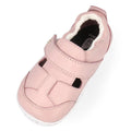 The Bobux XP Explorer Beau First Walker Sandal Blossom Pink 502305 is a single pink closed-toe shoe with a soft white lining, adjustable Velcro strap, small cutout details, and a flexible white sole., 9420075785915, 9420075784284, 9420075783980, 9420075784635