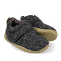 The Bobux Xplorer XP Marvel Felt in Charcoal Grey Olive features soft felt uppers, light brown rubber soles, a Velcro strap, and a suede toe cap. The baby shoes are shown with one shoe slightly overlapping the other.
