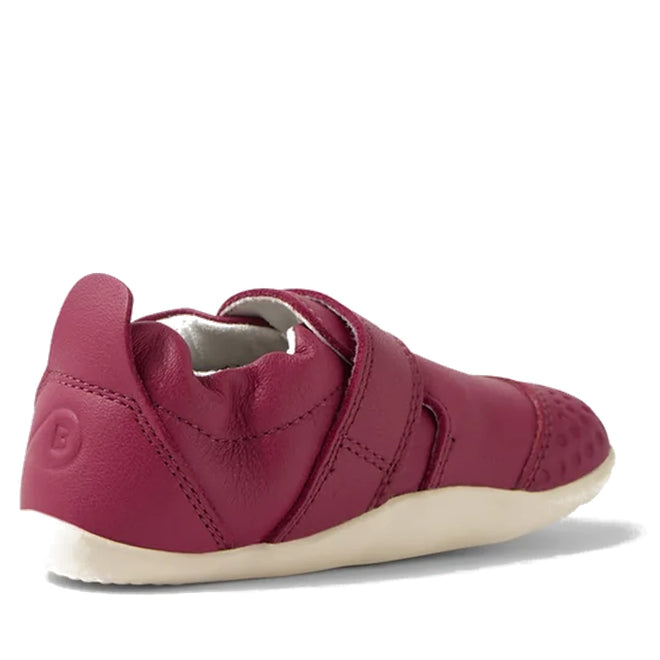 The Bobux XP Xplorer First Walking Shoes Go in Beaujolais Purple feature soft leather, a Velcro strap, and a flexible cream sole—shown from the back and side—making them ideal pre-walker shoes for babies taking their first steps., 9420074809070, 9420074809087, 9420074809094, 9420074809155