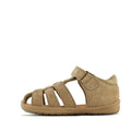 The Clarks Marcus Toddlers Taupe Leather Sandal (E width) features a closed heel, open toe, multiple horizontal straps forming a protective cage, a Velcro ankle strap, and a flat textured rubber sole. The background is plain white., 9336078595591, 9336078595638, 9336078595676, 9336078595713, 9336078595751, 9336078595799