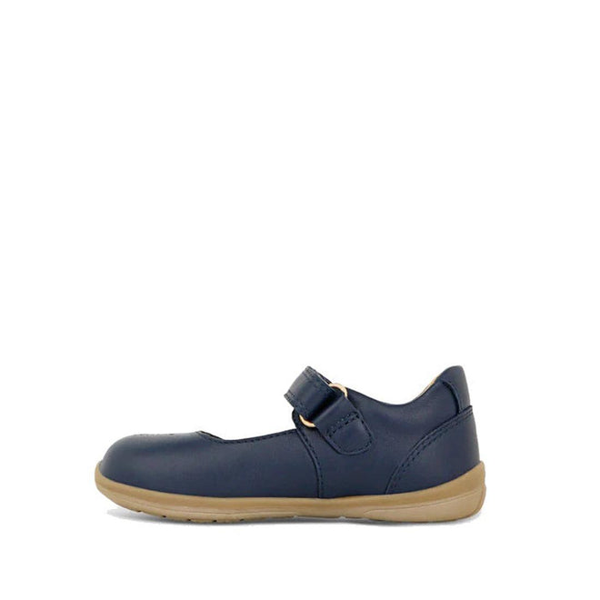 The Clarks Toddlers Maddison Leather Mary Jane Shoe in navy (D narrow width) features a rounded toe, tan rubber sole, and buckle strap. Displayed is a single shoe on a plain white background., 9336078974280, 9336078974303, 9336078974327, 9336078974341, 9336078974365