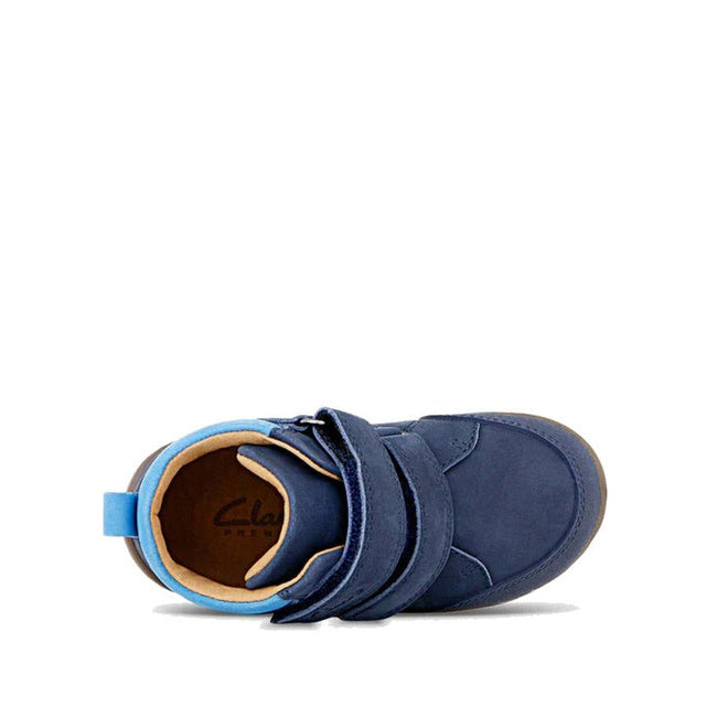 Top view of Clarks Kids Max Leather Boot Navy, a single blue leather kids' shoe with two self-fastening straps, brown lining, and a light blue heel pull tab on a plain white background., 36311, 9336078984241, 9336078984265, 9336078984289, 9336078984302, 9336078984326, 36317, 36318