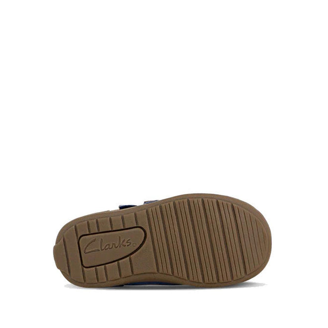 The image displays the sole of a Clarks Kids Max Leather Boot in navy. The brown sole has horizontal grooves for traction and features the Clarks logo near the heel, shown from the bottom against a white background., 36311, 9336078984241, 9336078984265, 9336078984289, 9336078984302, 9336078984326, 36317, 36318