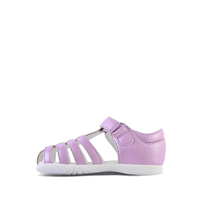 The Clarks Shelly Lilac Toddlers Leather Closed Toe Sandal features premium leather in light purple, multiple straps, a hook-and-loop ankle strap, and a white sole, shown against a plain white background., 9336078577535, 9336078577573, 9336078577610, 9336078577658, 9336078577696
