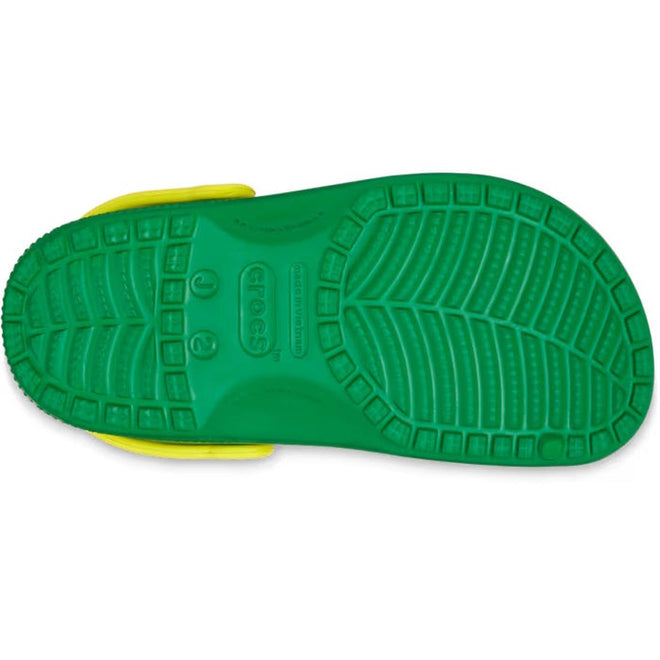 The image shows the sole of a Crocs Kids - Youths Retro Sport Classic Clog K Blue Bolt Green Yellow Sandal, featuring a detailed tread pattern, color-block design, and visible Crocs logo in the center., 198445214431, 198445214448, 198445214455, 198445214462, 198445214479, 198445214486, 198445214509, 198445214493, 48911
