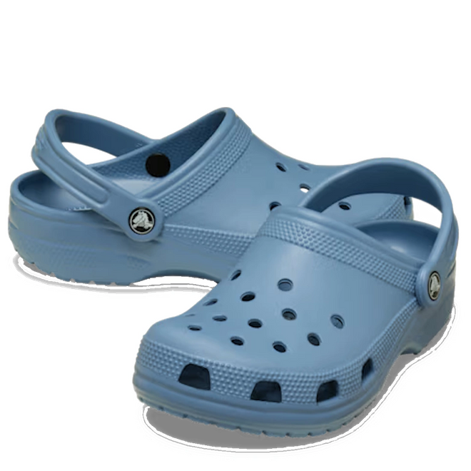 A pair of Crocs Classic Clog Astro Blue Adults Unisex, designed for comfort with ventilation holes and a pivoting heel strap, displayed against a white background.