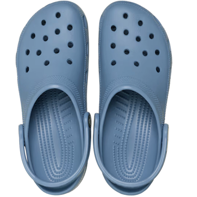A pair of Crocs Classic Clog Astro Blue Adults Unisex, shown from above on a white background, features ventilation holes across the top and an adjustable heel strap—ideal for those looking for a blend of style and comfort., 53294, 198445438936, 198445438943, 198445438950, 198445438967, 198445438974, 198445438820, 53301, 53302