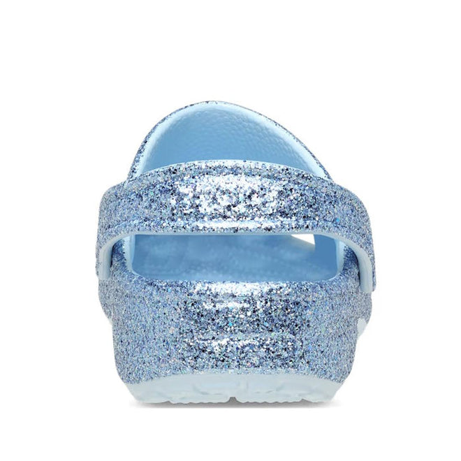 A rear view of the Crocs Kids - Classic Chunky Glitter Clogs in light blue, featuring a glitter-covered finish, textured sole, and back strap—perfect kids' shoes for extra sparkle., 198445287688, 198445287695, 198445287701, 198445287718, 198445287725, 198445287732, 198445287749, 49151