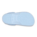 A light blue Crocs Kids - Classic Chunky Glitter Clogs, shown from the bottom, reveals a textured sole with tread patterns and the brand name embossed in the center—ideal for kids' shoe collections., 198445287688, 198445287695, 198445287701, 198445287718, 198445287725, 198445287732, 198445287749, 49151