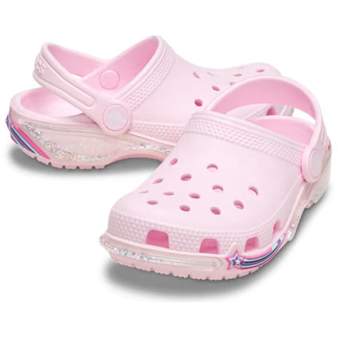 Crocs Star Sparkle Shaker Pink children's clogs with shotting star design on a white background.,
