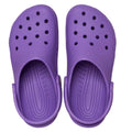 These Crocs Kids Classic Clog in purple, available in junior youth sizes, feature ventilation holes and adjustable back straps; they are water-friendly clogs shown from above on a white background., 198445337628, 198445337635, 198445337642, 198445337659, 198445337666, 198445337673, 198445337680, 49895, 49896