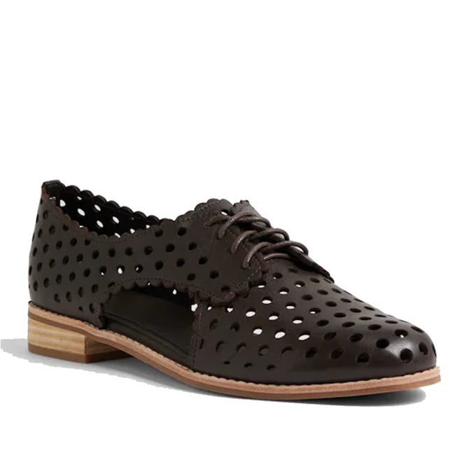 Introducing the Django & Juliette Adalina Leather Womens Cut Out Brogues Summer Shoes in Chocolate Brown—a stylish women’s lace-up shoe crafted from premium leather, featuring laser-cut polka dot holes throughout for a breathable and casual design. Scalloped edges, a low stacked wooden heel, and classic brogue-inspired cut-outs make these shoes perfect for those seeking both comfort and elegance in summer footwear.