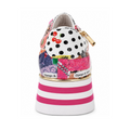 Back view of Django & Juliette Eammes Collage Patent Leather Platform Shoe Women’s in colorful polka dots, cherries, gold accents, and mixed patterns. Features a bold pink-and-white striped platform sole and side branding.