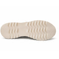 Beige, wavy-textured chunky sole of the Django & Juliette Eminta Platform Shoe Sheer Leather Black Milk Lace Up viewed from below, showing a non-slip tread with multiple horizontal ridges.