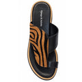 The Django & Juliette Shuua Platform Flip Flop Black Tan Zebra features a black leather slide, zebra-striped wide strap, toe loop, striped platform sole, and a black insole with Django & Juliette in white.